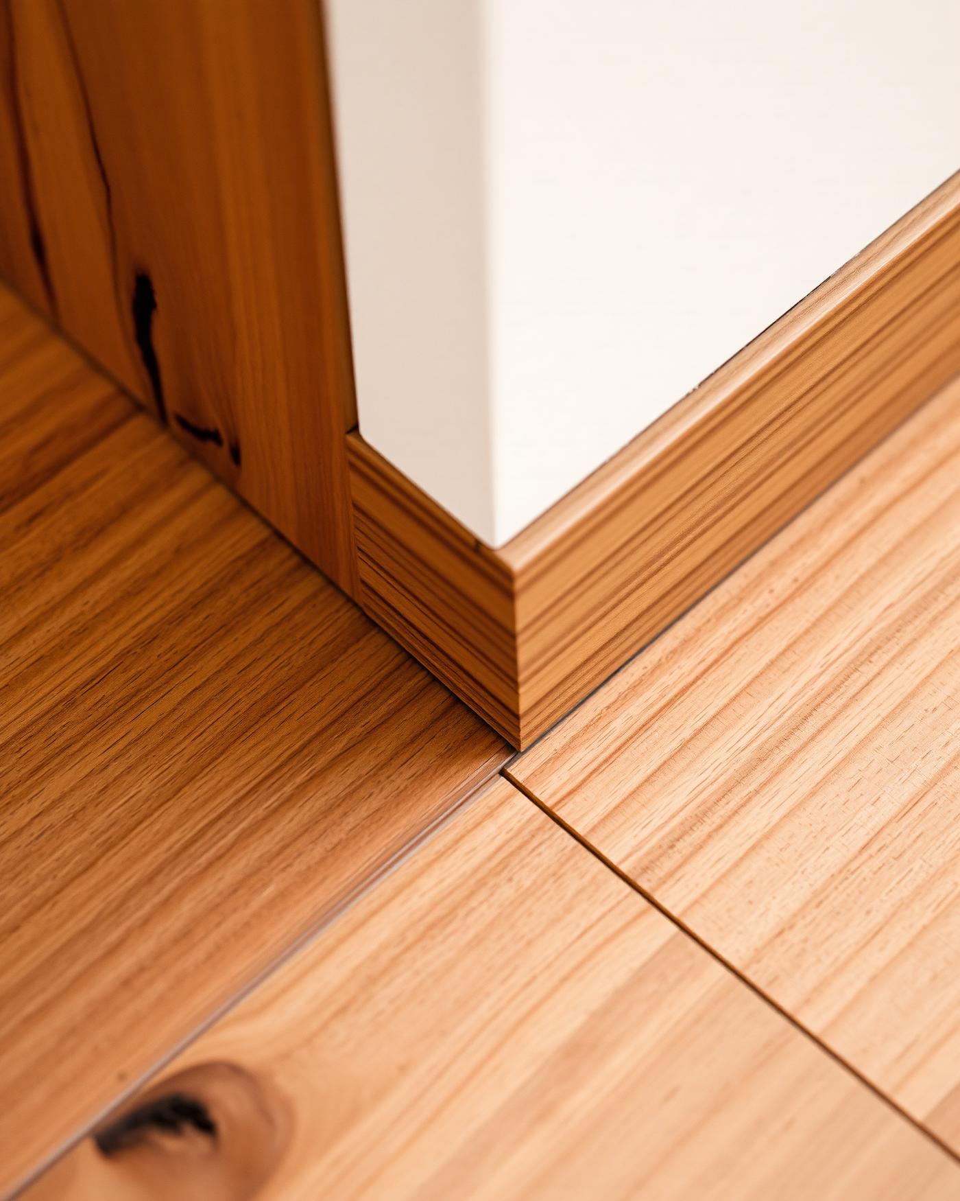 Precision scribed cut where new timber meets architrave